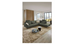 Komfort-Ecksofa plano|FORM Formello, in der Farbausführung Grün, in einem Raum stehend
