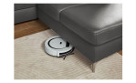 Detailfoto von der Sitzhöhe mit einem Staubsaugroboter