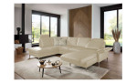 Komfort-Wohnlandschaft plano|FORM Lirio, in der Farbalternative Beige, in einem Raum stehend mit der Relaxfunktion bei der Ottomane