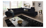 Komfort-Ecksofa Valentino, in der Farbausführung Anthrazit, in einem Raum stehend, mit der Sitztiefenverstellung