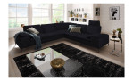 Komfort-Ecksofa Valentino, in der Farbausführung Anthrazit, in einem Raum stehend, mit der Sitztiefenverstellung