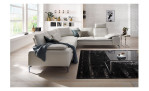 Komfort-Ecksofa Valentino, in der Farbausführung Creme Weiß, in einem Raum stehend,mit der Sitztiefenverstellung, Frontansicht 