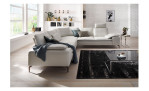 Komfort-Ecksofa Valentino, in der Farbausführung Creme Weiß, in einem Raum stehend,mit der Sitztiefenverstellung, Frontansicht 