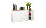 Kommode Moonlight aus Holzwerkstoff in weiß mit einer Absetzung in Artisan Eiche mit zwei Türen und vier Schubkästen mit Dekoration