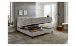 Boxbett Wicky, in der Farbausführung Grau, in einem Raum stehend mit dem offenen Stauraum