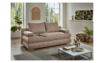 Schlafsofa Borna, in der Farbausführung Taupe, in einem Raum stehend mit Kissen und Deko