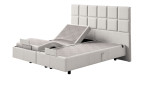 Boxspringbett Discovery Classic in einem Bezug in White Fabric in Stoff. Schräge Seitenansicht