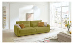 Basis-Big Sofa planoform Cochem in der Farbe Hellgrün mit hellgrünen und braunen Kissen im Wohnzimmer