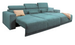 Komfort-Wohnlandschaft Carter in der Farbe Blau, Ottomane auf der rechten Seite. In dekorierter Umgebung. Darstellung der Funktionen.