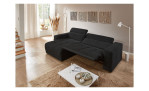 Wohnlandschaft Leona in Schwarz mit Relaxfunktion und Ottomane links, fotografiert im modern eingerichteten Raum.