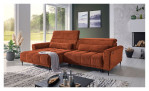 Komfort-Wohnlandschaft Lilly in einem orangefarbenen Cordstoff mit zwei Zierkissen. Auf einem dekorierten Hintergrund.