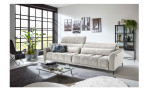Komfort-Big Sofa Lilly mit einem Cordbezug in Creme, 1 Kopfteil ist hochgeklappt, Milieubild