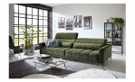 Komfort-Big Sofa Lilly mit einem Cordbezug in Grün, 1 Kopfteil ist hochgeklappt, Milieubild