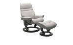 Relaxsessel mit Hocker Stressless Sunrise M Classic in grauem Leder mit grauem Gestell.