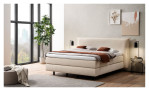 Komfort-Boxspringbett MONDO Barell - Jerez in einem bezug in beige. Auf einem dekorierten Hintergrund