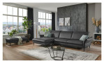 Komfort-Ecksofa MONDO Mirum in einerm Echtlederbezug in Anthrazit. Auf einem dekorierten Hintergrund