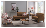 Die Mondo Komfort-Sitzgruppe „MONDO Quadra“ und der Sessel mit Blumenmuster verleihen diesem modernen Wohnzimmer einen stilvollen Akzent.