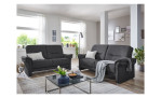 Komort-Sitzgruppe MONDO Recita, in der Farbausführung Black, in einem Raum stehend mit Kissen und Decke