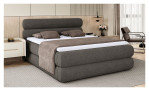 Boxspringbett Nova in der Farbe dunkelgrau in einem Raum stehend