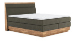 Boxspringbett MONDO NATUR Incana in einem Stoffbezug in Hunter und einem Sichtholzrahmen in Eiche