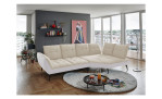 Basis-Ecksofa vito Ticona, in der Farbausführung Creme / Silber, in einem Raum stehend
