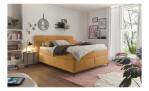 Boxspringbett set one Fairfield in der Farbe gelb, in einem Raum stehend