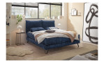 Boxspringbett set one Baldwin in der Farbe dunkelblau, in einem Raum stehend