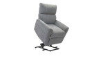 Relaxsessel Ariana aus grauem Stoff mit Aufstehhilfe und Metallgestell, der als funktionale Aufstehhilfe dient.