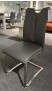 Schwingstuhl „Mirafor“ aus echtem Leder in modernem Grau mit einem Gestell aus gebürstetem Edelstahl, ausgestellt im Showroom.