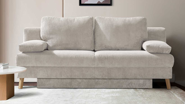 Hellbeiges Schlafsofa aus Cord Stoff mit zwei Rückenkissen und Armlehnen