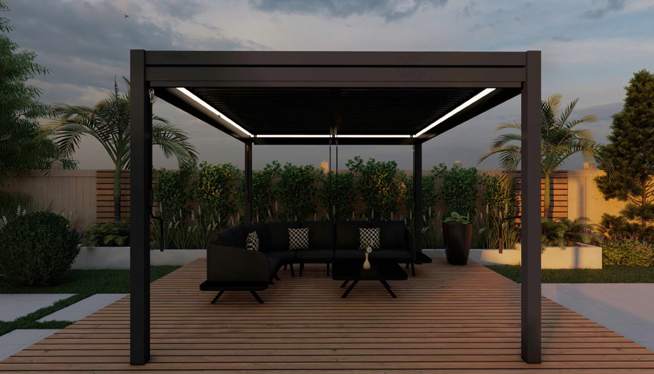 Gartenpavillon Shadow im grünen Garten, mit pulverbeschichtetem Aluminiumgestell in Anthrazit, verstellbaren Lamellenwände und optionalem LED-Beleuchtungssystem.